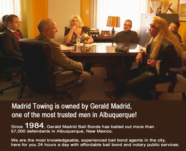 Gerald-Madrid-Towing-with-Dog-the-Bounty-Hunter Madrid Auto Wrecker Truck roadside assistance jump starts